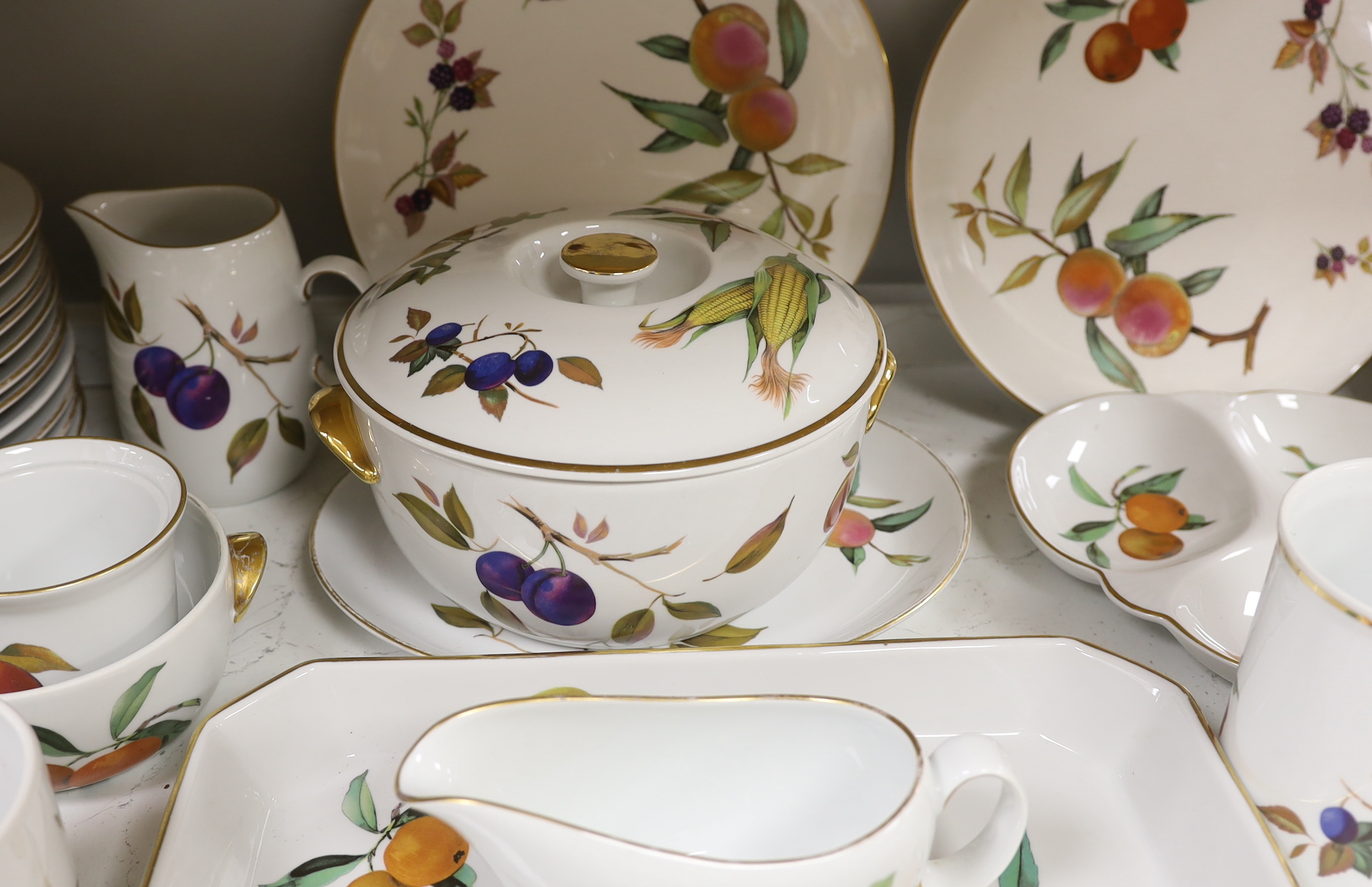 A large quantity of Worcester Evesham dinnerware, including; plates, bowls, serving dishes, jugs, flan, dishes, etc. (70 pieces)